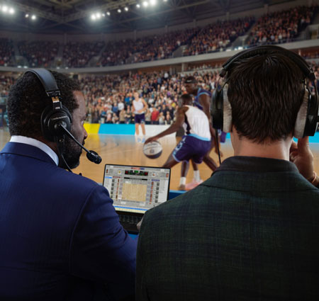 courtside annoucers at a basketball game