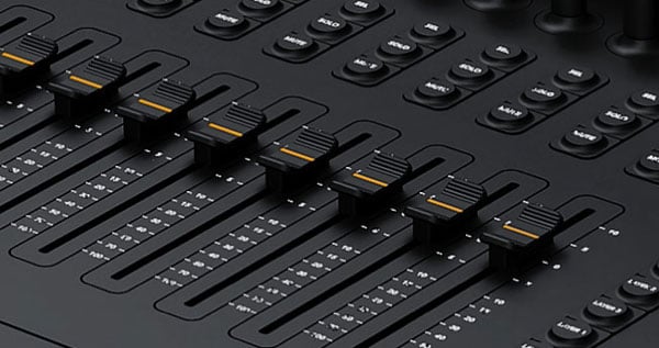 close up of the blackmagic fairlight live audio panel faders