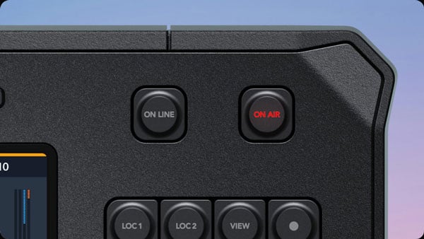 Close-up of the Blackmagic Design fairlight panel corner showing the ON LINE and red ON AIR buttons