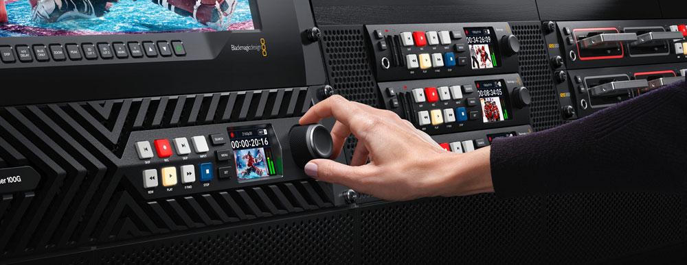 someone turning the control knob on the blackmagic hyperdeck in a studio