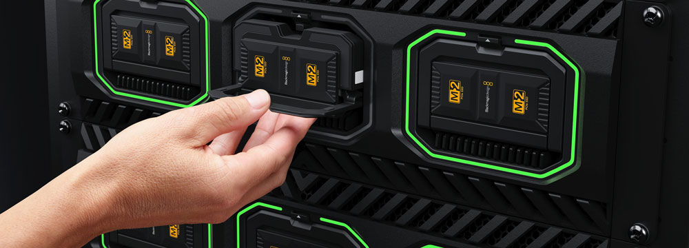 blackmagic media module being pulled out of the media dock ultra