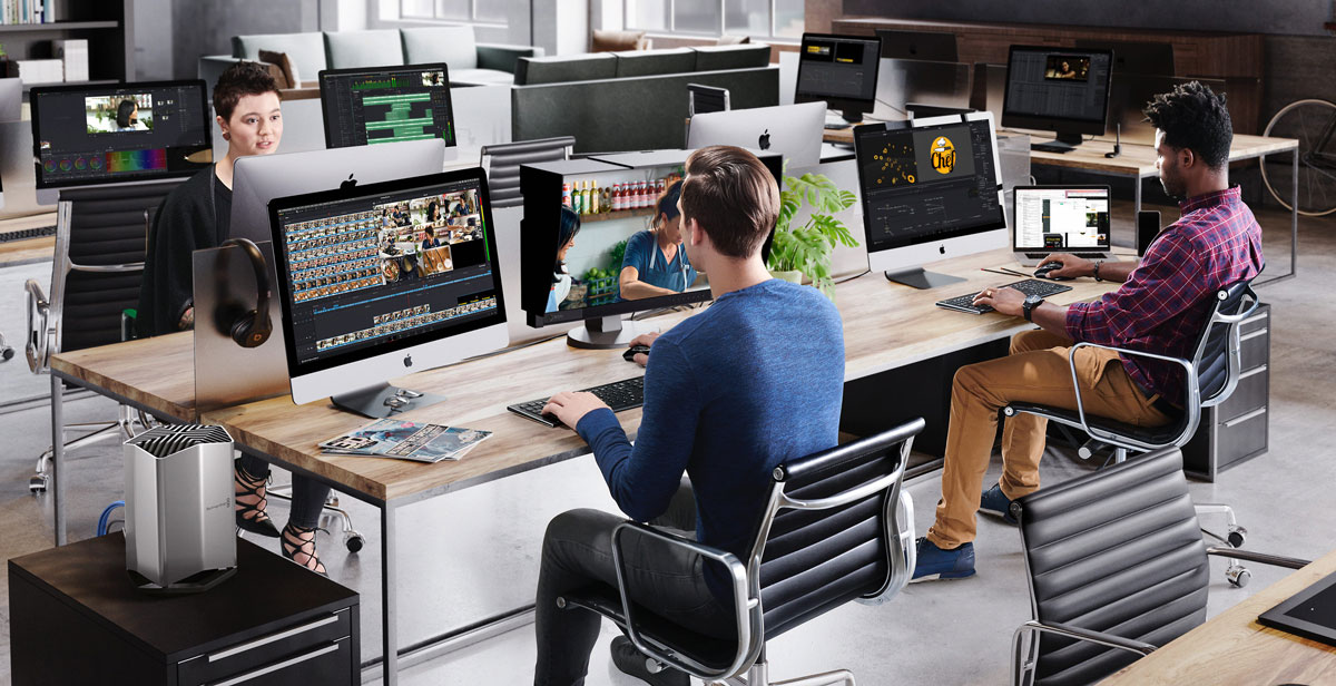 people workign in a studio using different software tools
