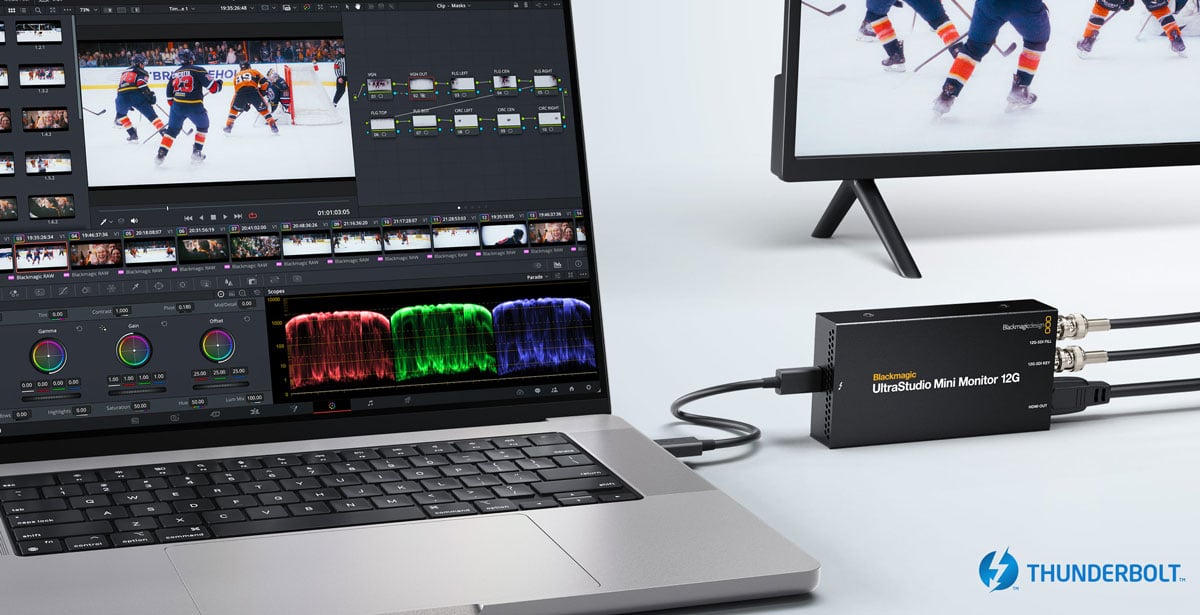 ultrastudio mini monitor 12g connected to a laptop using a thunderbolt cable
