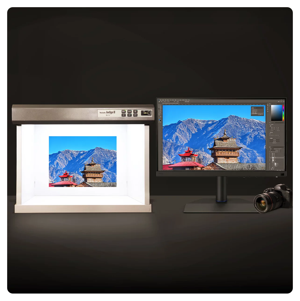benq monitor with an image of a temple on the screen with a print of the same image next to it on a black background