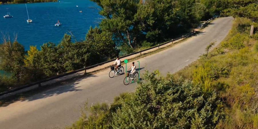 dji mini 5 pro tracking someone on a bike