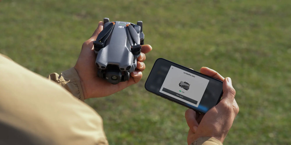 someone holding the dji mini 5 pro