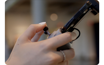 close up photograph of person using DJI RC controller