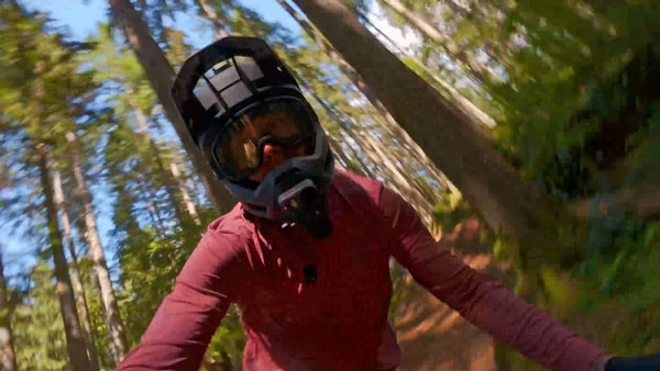 someone riding a bike being filmed with the dji osmo nano