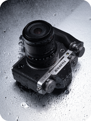 the fujifilm xf30mm macro lens splashed with rain showing the weather-resistant design