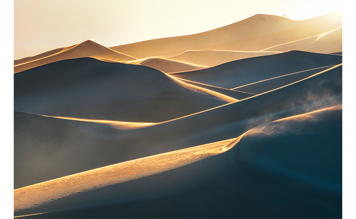 Fujifilm XF150-600mm Lens Sample Image of sand dunes being lit with golden hour sunlight 