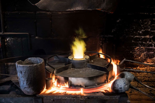 Fujifilm XF16-55mm F2.8 R LM WR II sample image of firing furnace and crucible smelting metal