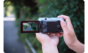 person shooting video with Fujifilm X-M5 with Cooling Fan