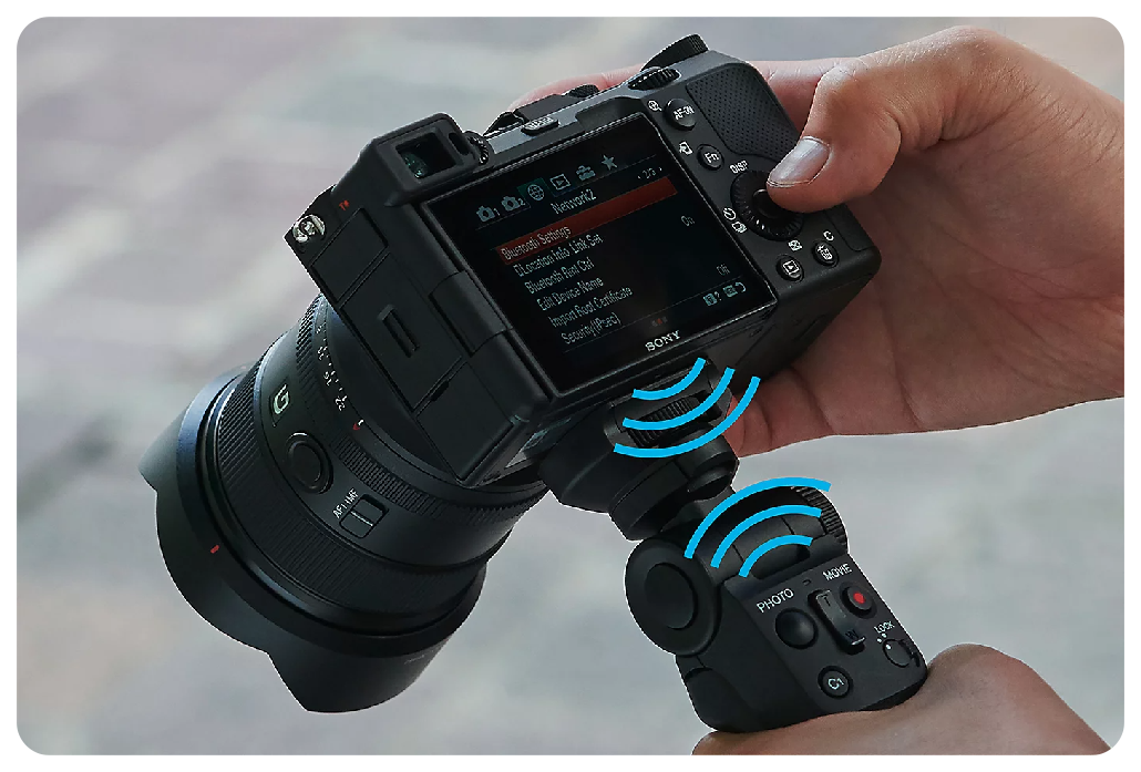 Sony A7C being held and adjusted by a vlogger