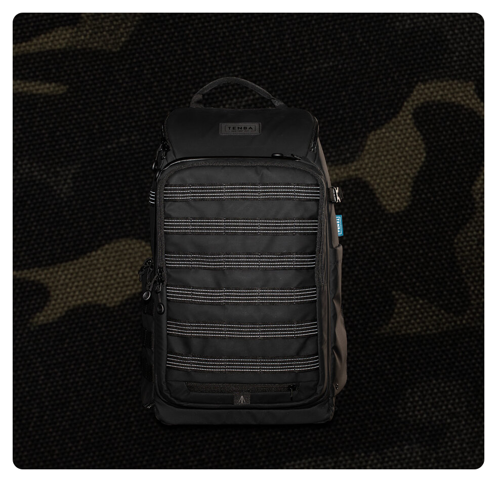 front view of the backpack showing the MOLLE reflective webbing, Tenba Axis V2 24L Backpack Multicam Black
