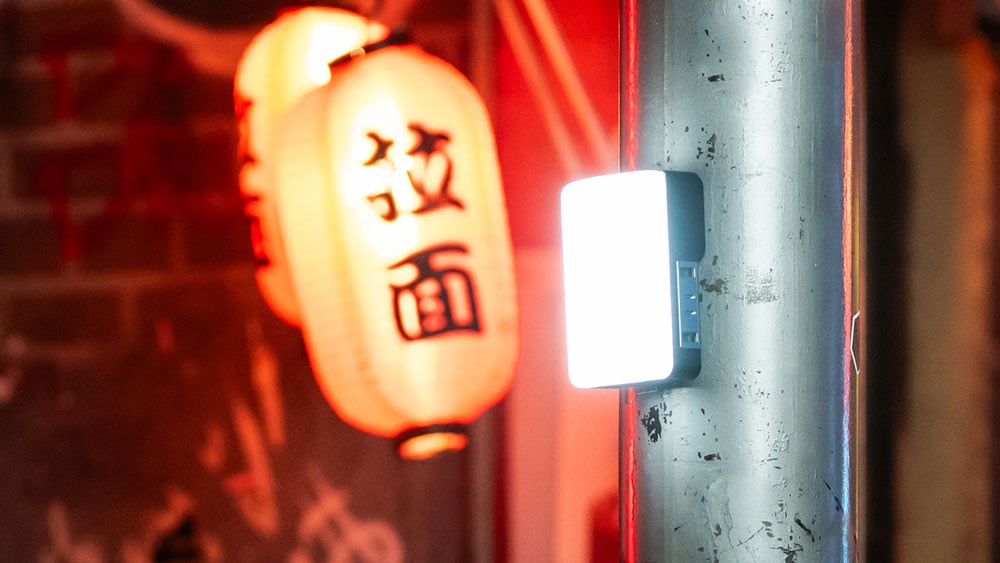 amaran light magnetically mounted to the side of a lamp post