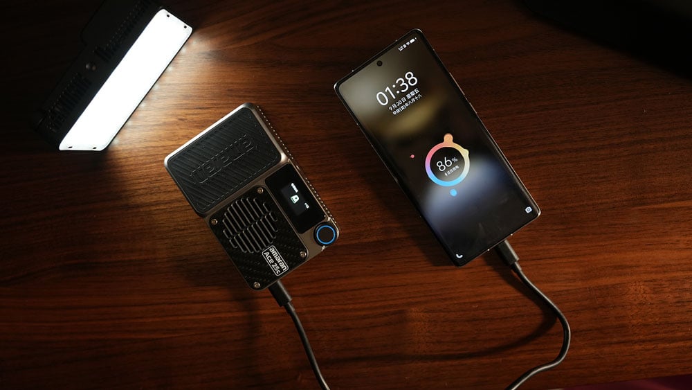 the amaran led light connected to a phone via usb-c being used as a power bank