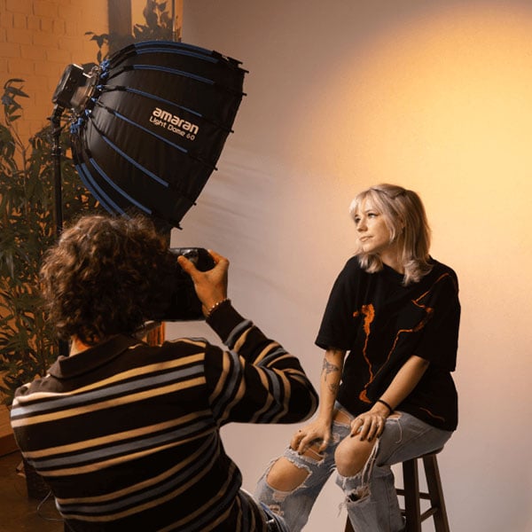 amaran monolight in use on set while a woman is being photgraphed