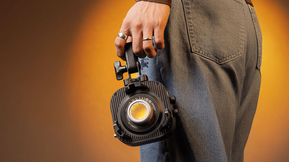 somoene holding the amaran monolight
