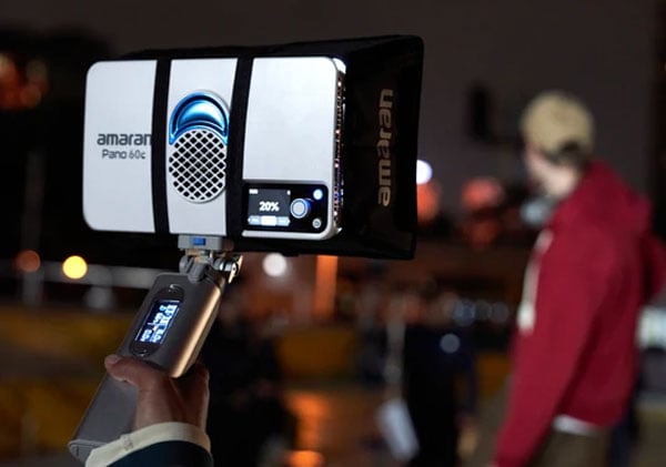 someone holing the amaran pano 60c connected to the power bank