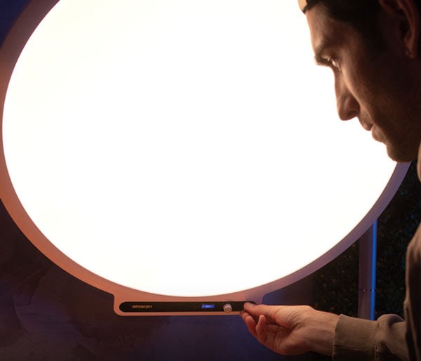 somone adjusting the panel light using the front facing controls