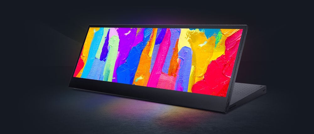 the asus proart pa147cdv touch screen monitor showing paint splashes on a dark background