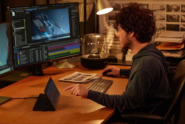 someone using the asus proart pa147cdv touch screen monitor as a control panel