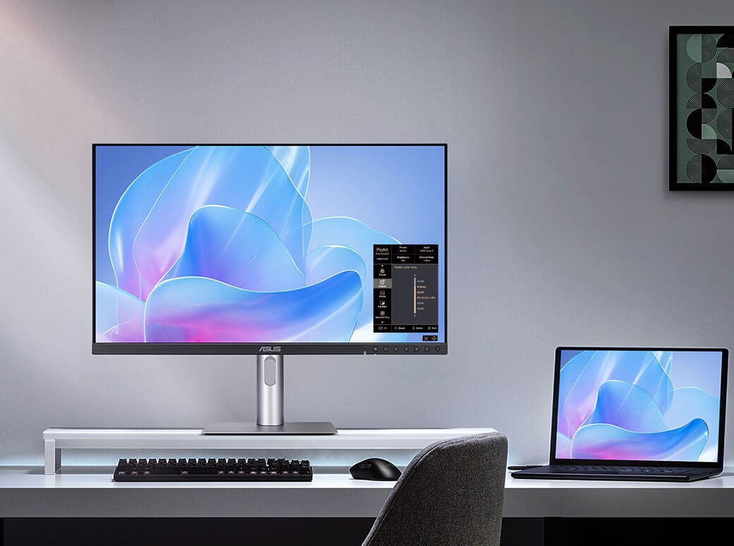 asus proart monitor on a desk connected to a laptop