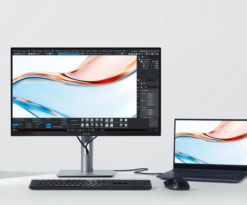 asus pro art monitor ona desk connected to a macbook