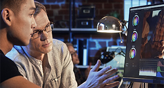 colourist looking at work on the asus proart monitor