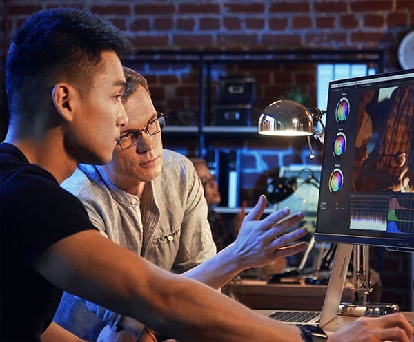 two colourists comparing work on the asus proart display