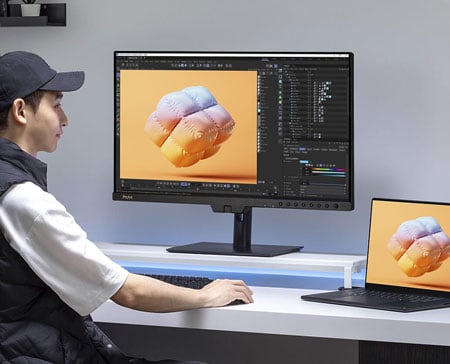 someone animating a pillow cube on the asus proart monitor
