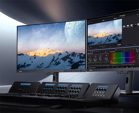 asus pro art monitor in use within a studio with control panels