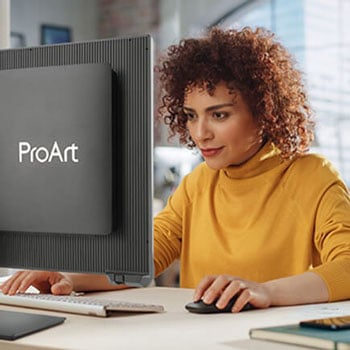 Graphic Designer using ASUS ProArt monitor to create illustrations 