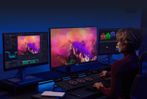 colourist working and ProArt workstation grading footage in DaVinci Resolve