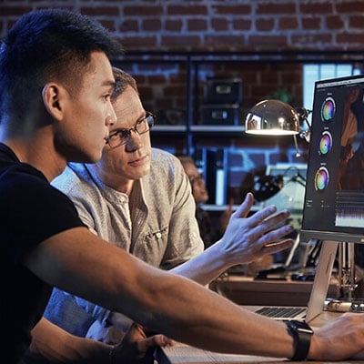 colourists looking at the asus proart monitor