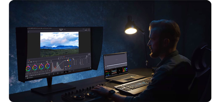 man colour grading video with DaVinci Resolve on ASUS ProArt PA32UCG-K Professional 4K HDR Monitor
