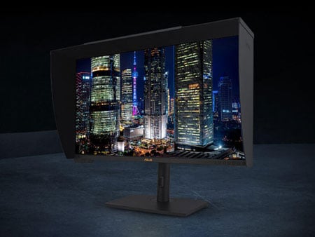 asus pro art monitor on a metal desk