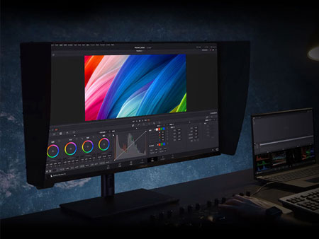 asus pro art monitor with shade hood being used for editing