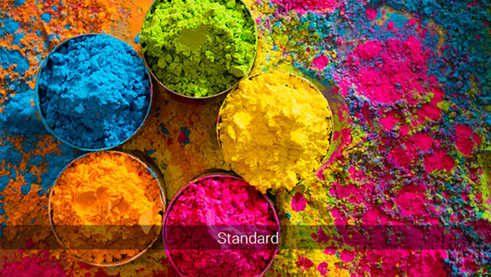 image of powdered paint pigments in post and on the floor