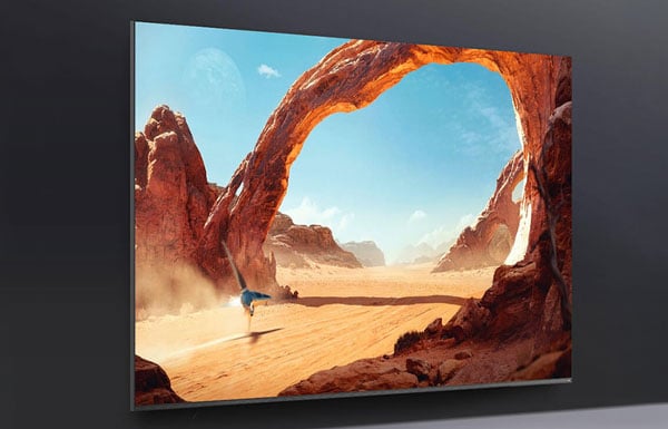 asus pro art cinema diaply mounted ona grey wall