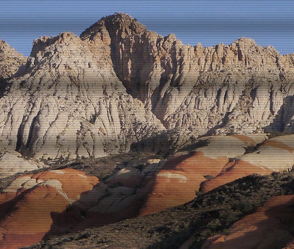 comparsion image of sandstone mountains on a normal display