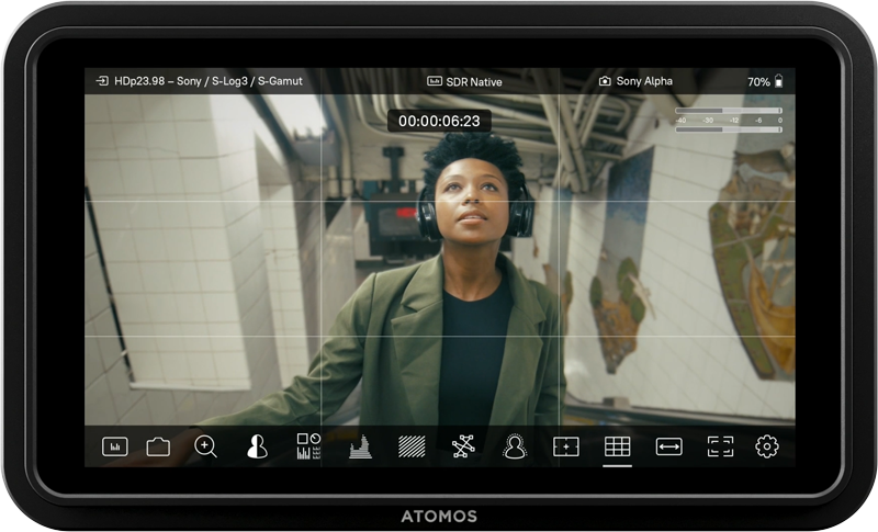 atomos shinobi 7 showing a woman exiting a train station