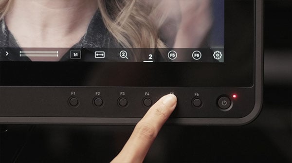 close up of someone using the button controls on the sumo pro-19