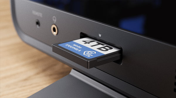 close up of a cfexpress card being inserted into the sumo pro-19