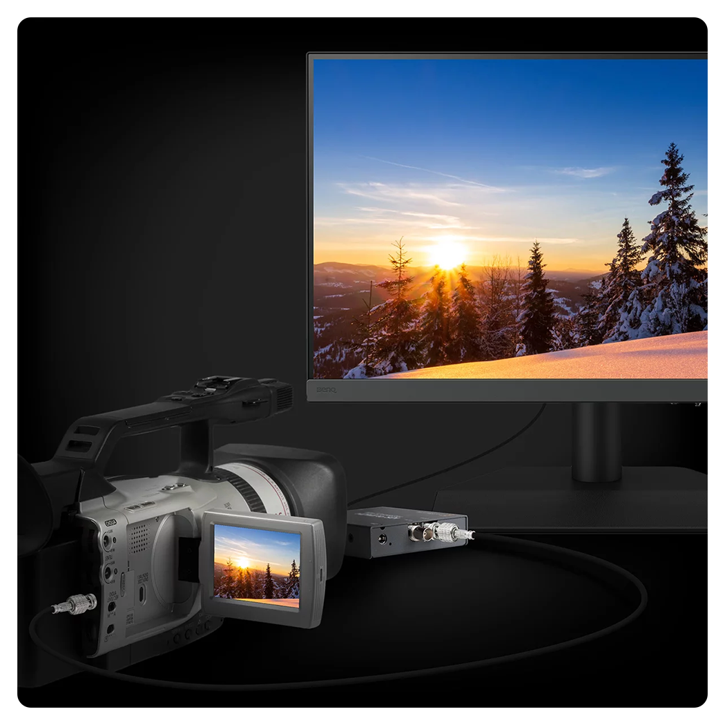 video camera connected to the benq monitor on a black background