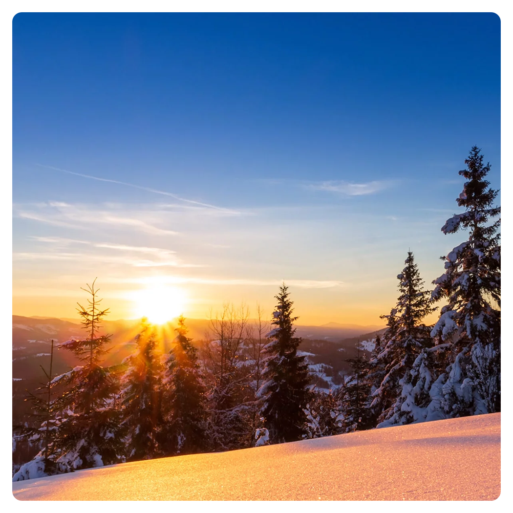 hdr sample image of the sunset from a snowy hill