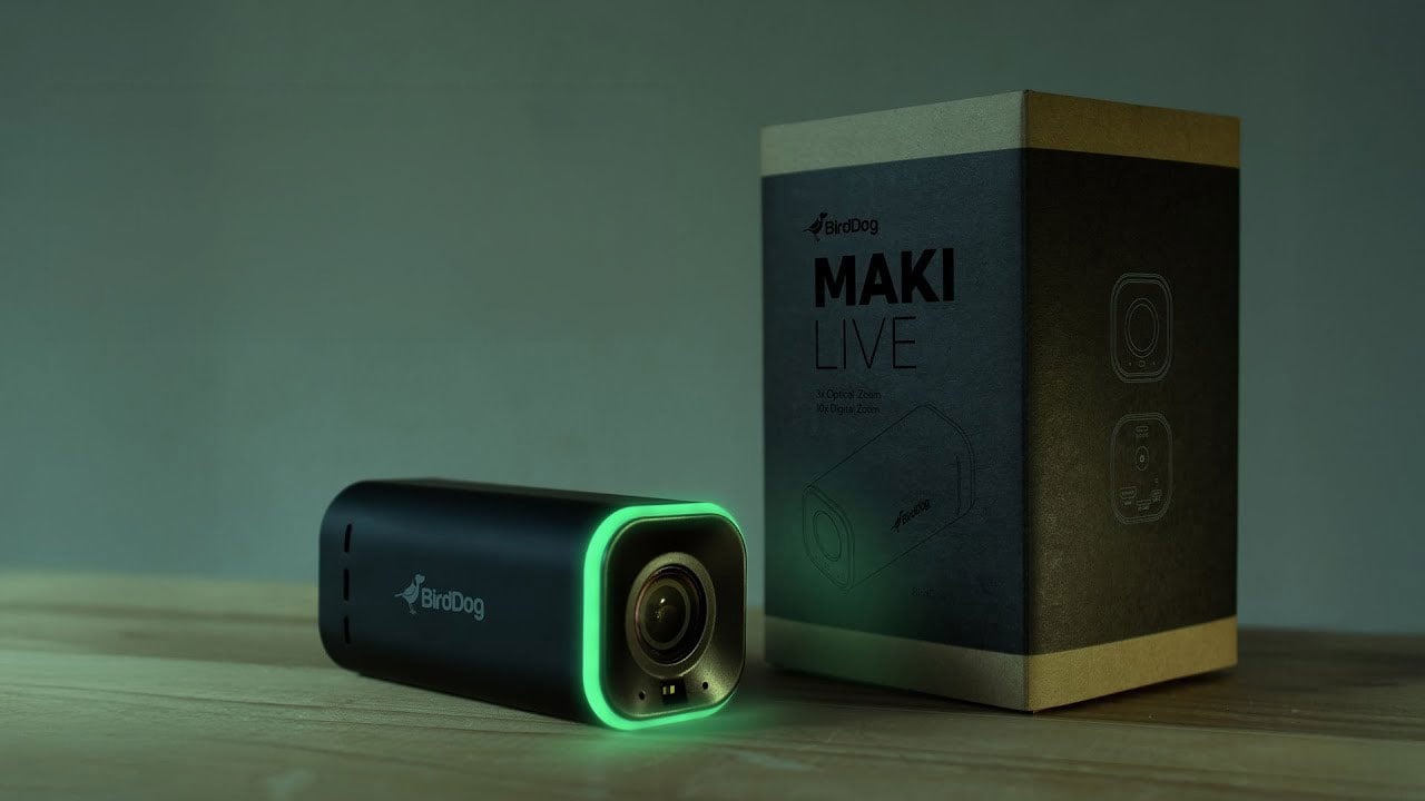 maki live camera with packaging on a wooden desk under a green light