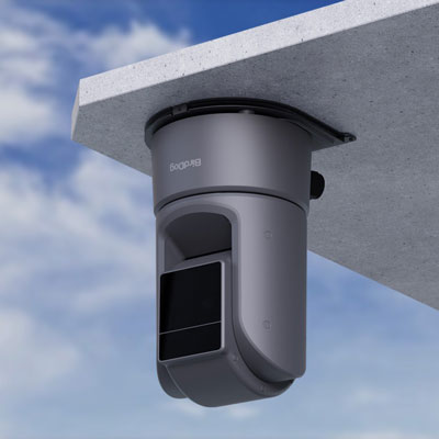 BirdDog O4 outdoor ptz camera ceiling mounted to an outdoor roof overhang