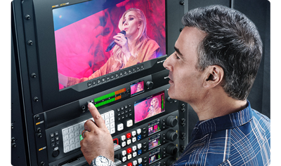 image of man monitoring video on rackmounted blackmagic Smartview 3