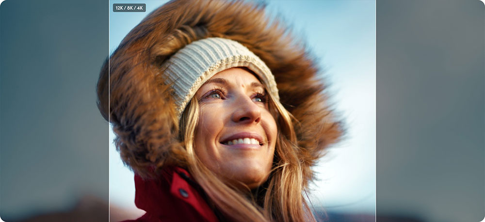 an image of a woman wearing a red jacket with a faux-fur trim hood and a knitted beanie showing aspect ratio comparison